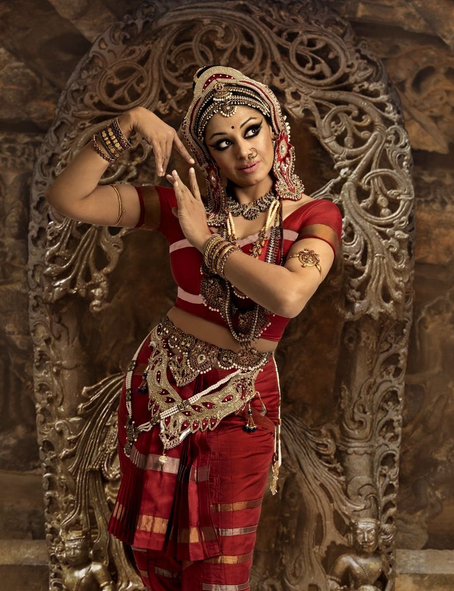 Shobana in costume, hands in mudra