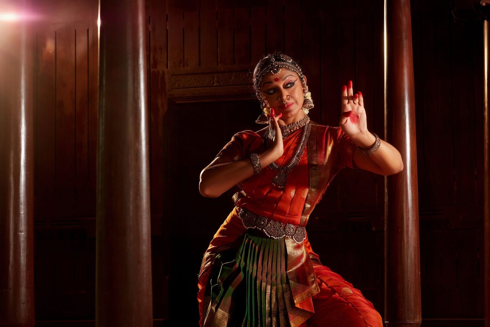 Shobana performing under stage light